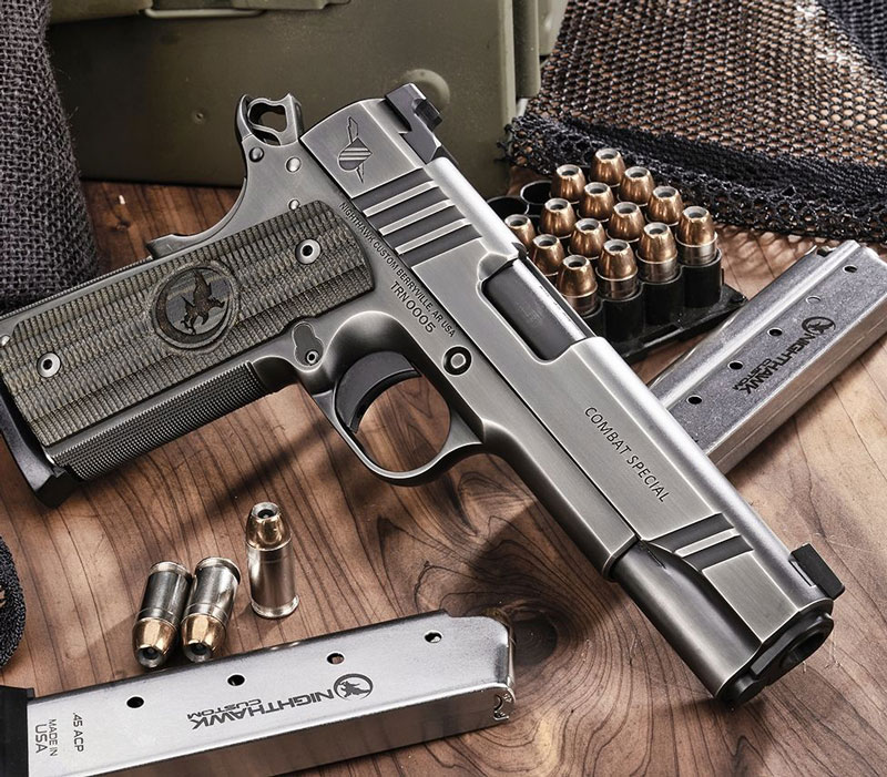 closeup of pistol with ammo